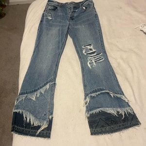 Free people distressed flare jeans with print bottoms